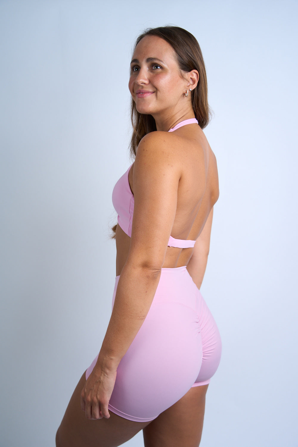 pinker Twist Backless Sport-BH von der Seite