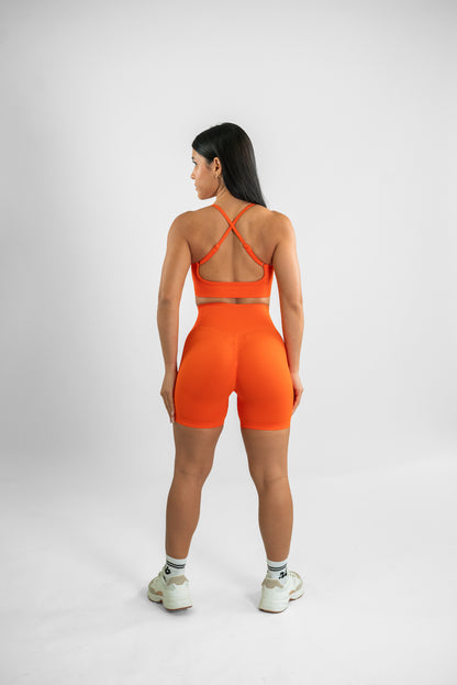 orange Coast Lift Seamless Scrunch Shorts von hinten Ganzkörperaufnahme